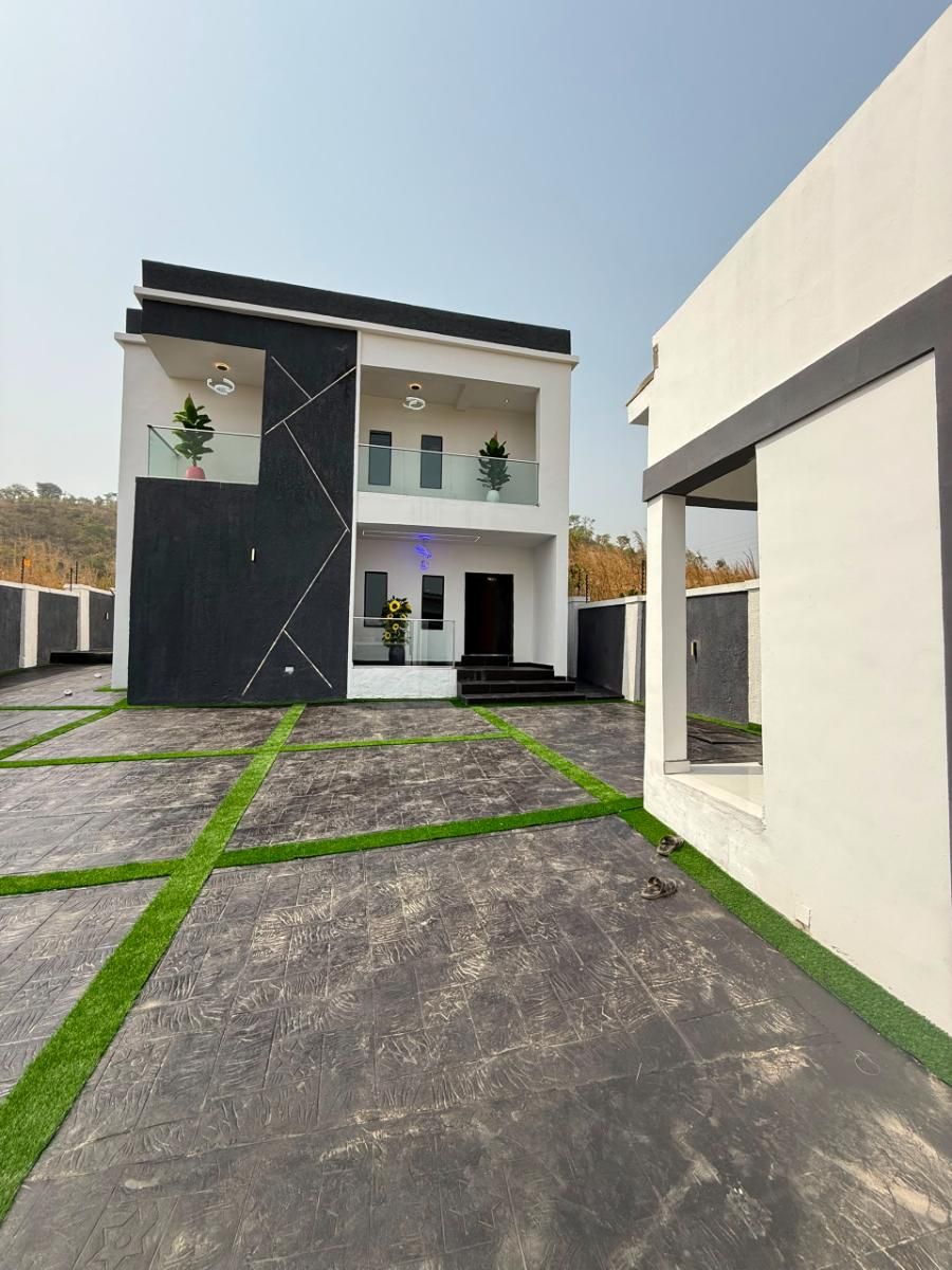 Exclusive 4-Bedroom Duplex with a Gateman House