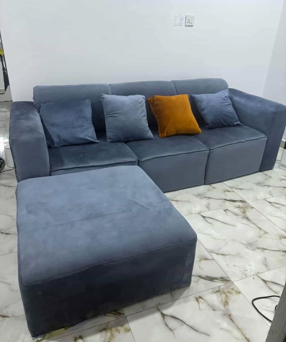 L shaped sofa plus throw pillows