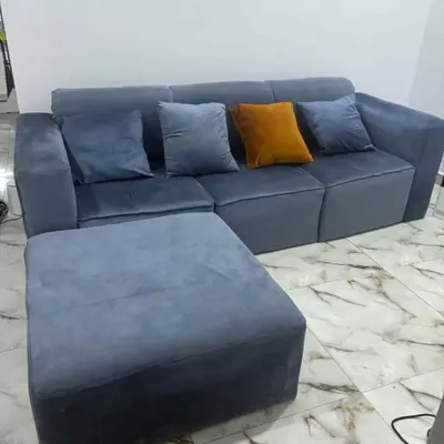 L shaped sofa plus throw pillows